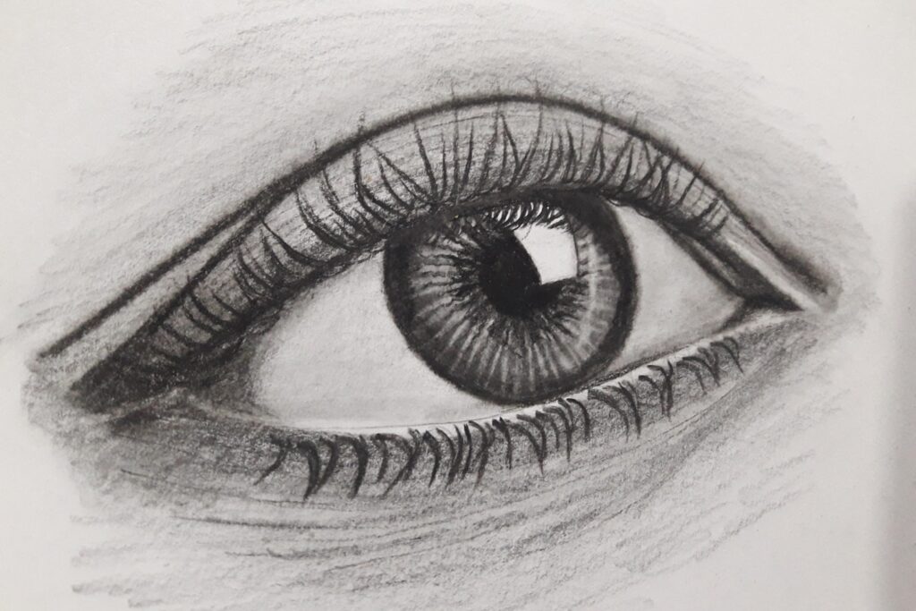persons eye in grayscale